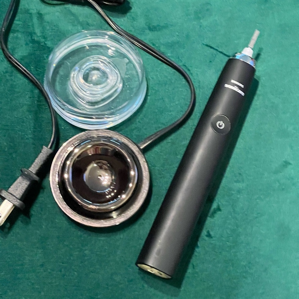Philips Black Electric Toothbrush with Charging Base